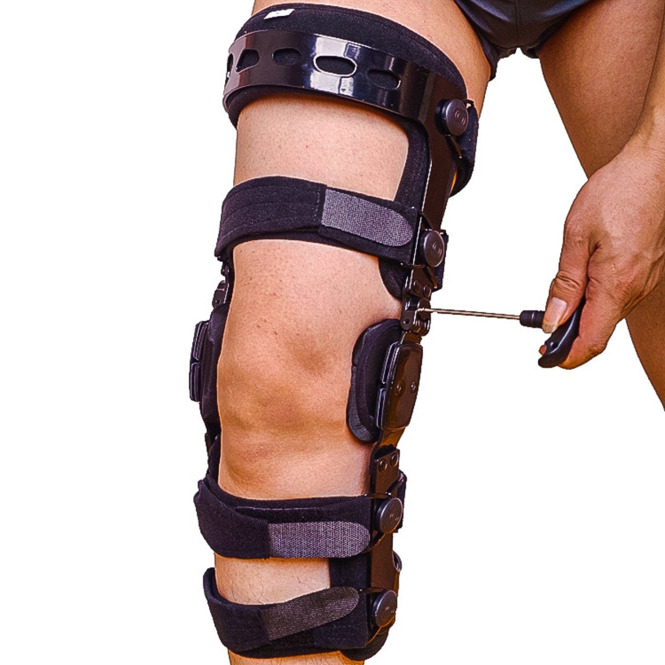 Premium Photo  Knee with knee brace support after surgery with walking  stick of patient in hospital